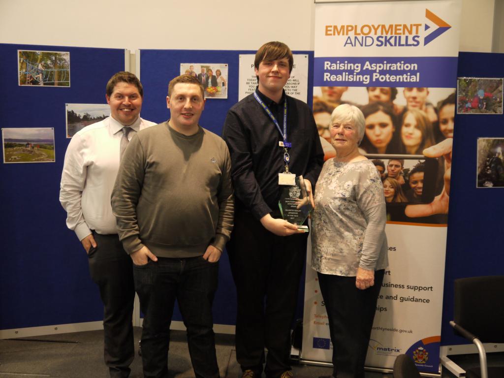 Jeanette Hedley's family with Andrew Burns, winner of the Jeanette Hedley Apprentice of the Year