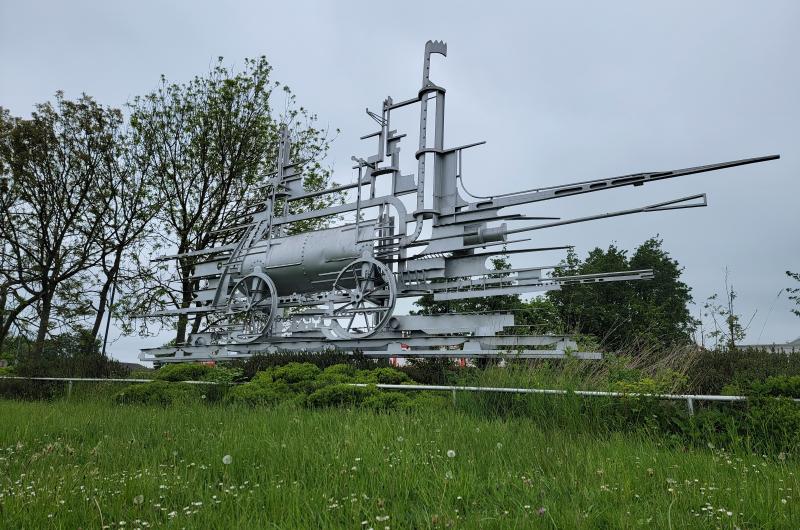 A metal sculpture of a train at Killingworth