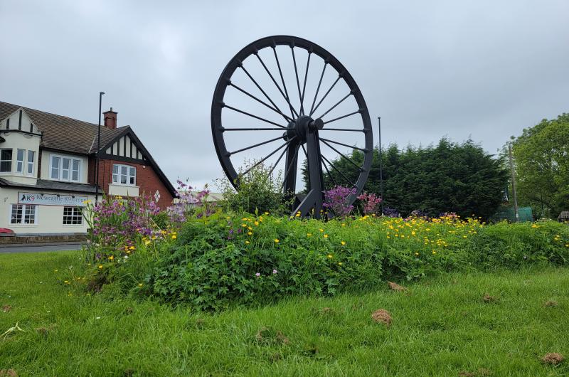 The Burradon Wheel, a large commemorative artwork of a pit wheel