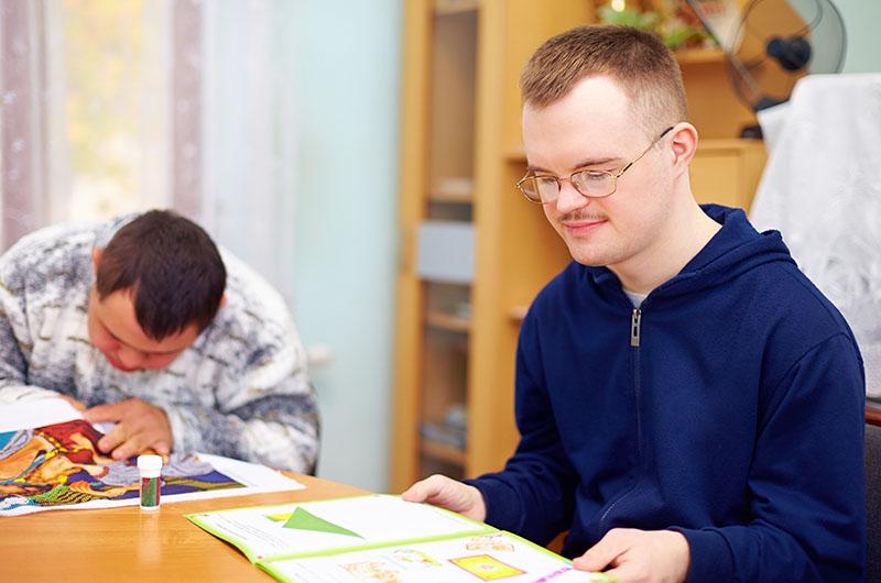 Young men with disabilities in a classroom