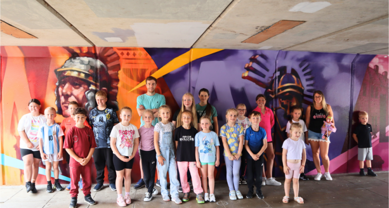 Artist Mark with Move it Studio helpers