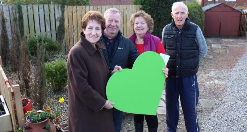 Michael Robson, middle-left, with Elected Mayor Norma Redfearn and some of his neighbours who helped him with the work on the area