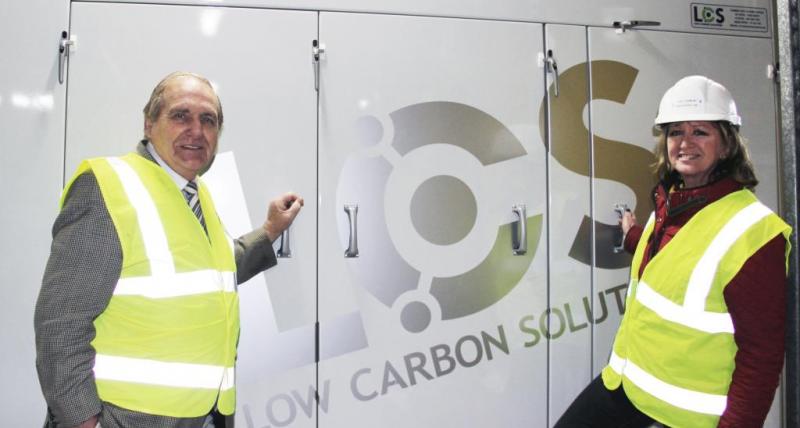 Cllr John Stirling, cabinet member for Sustainable Development, and Fiona Taylor, of Low Carbon Solutions with the Combined Heat and Power unit