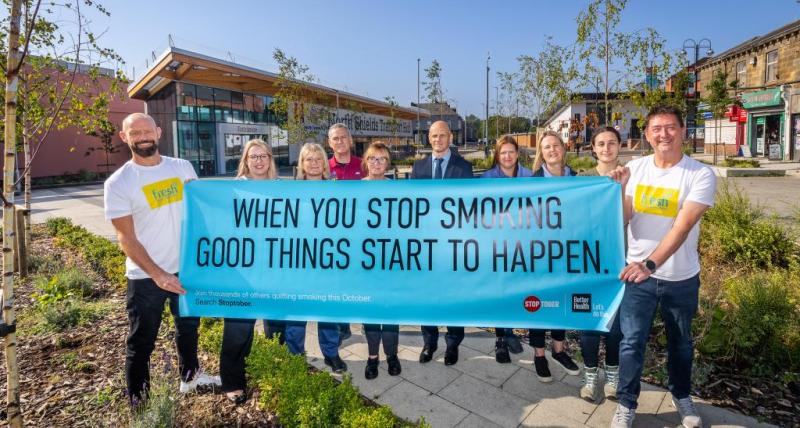 Stoptober banner and health professionals