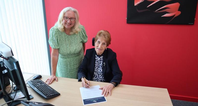 Dame Norma Redfearn signs UK100 pledge